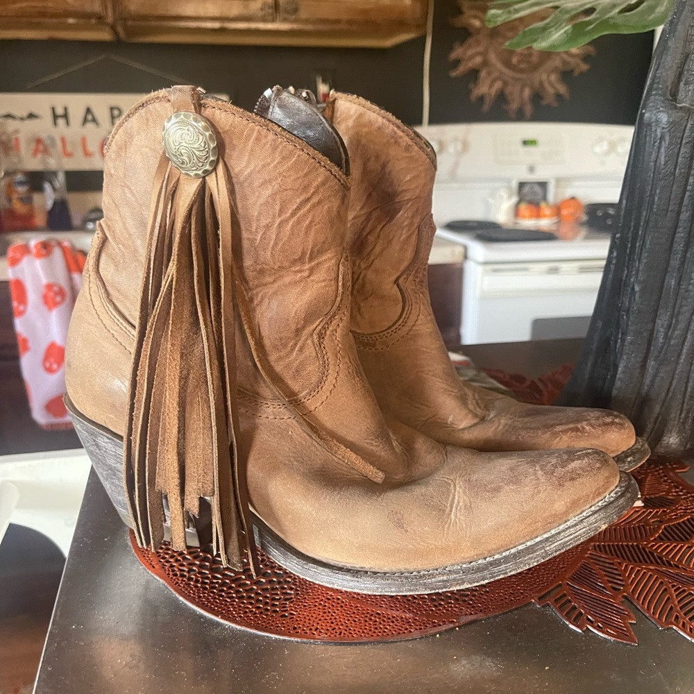 Tan cowboy bootie with fringe tassel